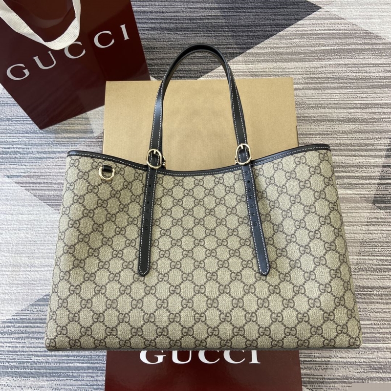 G*u*i shopping bags